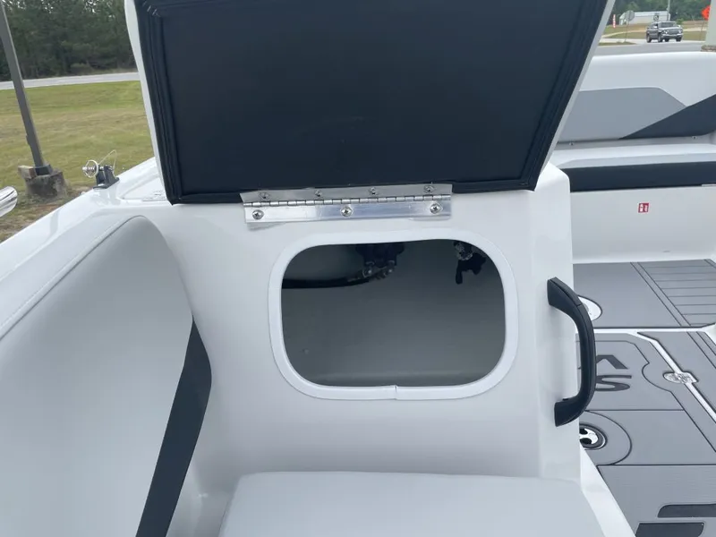 Slide: The Image of Starcraft SV 18 OB 2026 boat with open storage compartment. - 14