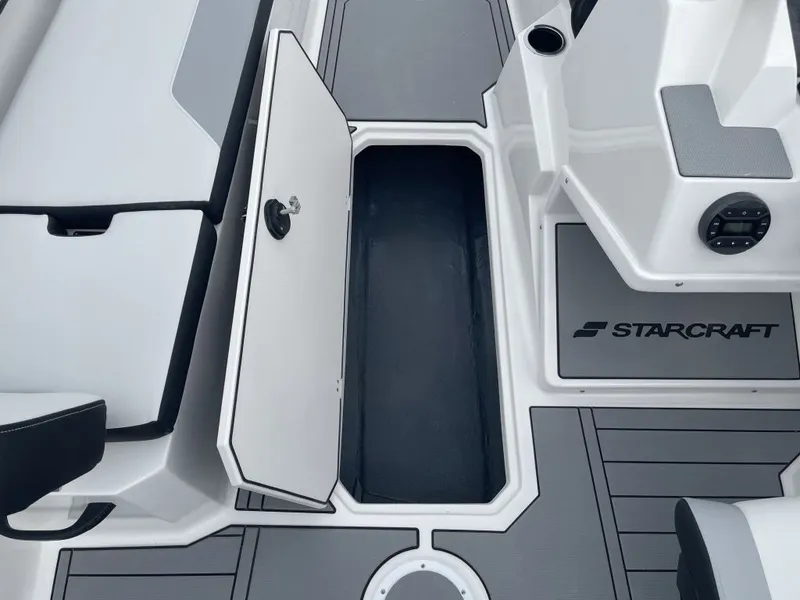 Slide: The Image of Starcraft SV 18 OB 2026 boat with open storage compartment. - 17