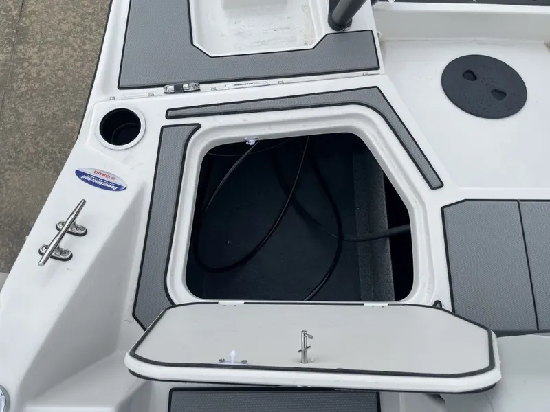 Slide: The Image of Starcraft SV 18 OB 2026 boat with open storage compartment. - 20