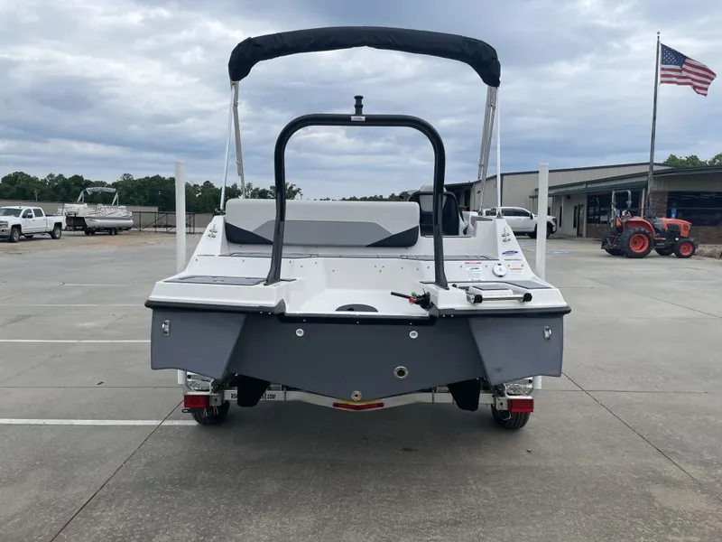 Slide: The Image of Rear view of 2026 Starcraft SV 18 OB boat in a parking lot. - 4