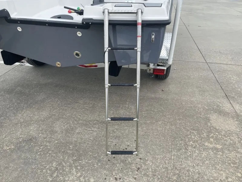 Slide: The Image of Starcraft SV 18 OB 2026 boat with retractable ladder. - 5