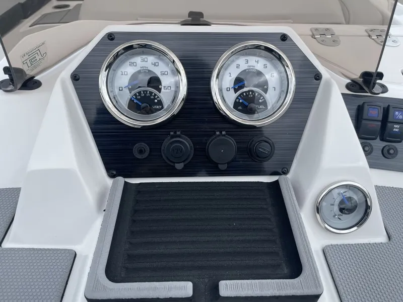 Slide: The Image of Dashboard of 2026 Starcraft SV 18 OB with speedometer and fuel gauge. - 8