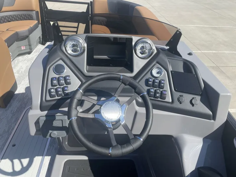 Slide: The Image of 2026 Sylvan L-3 LZ DH helm with steering wheel and controls. - 6