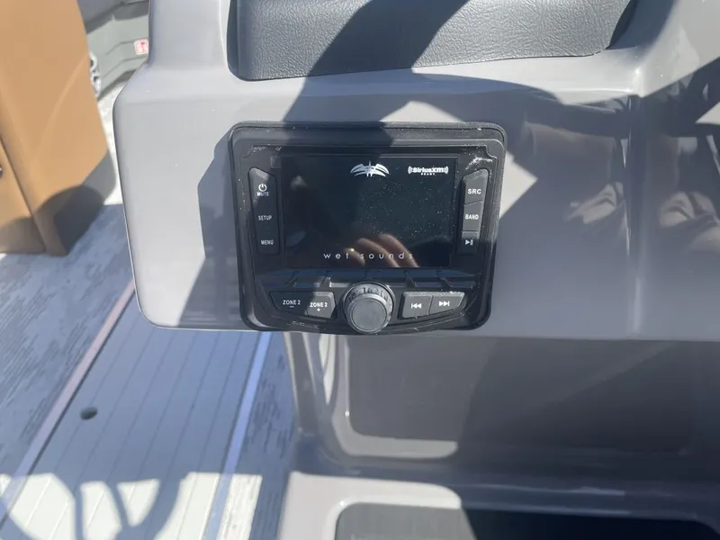Slide: The Image of Sylvan L-3 LZ DH 2026 boat console with Wet Sounds control. - 9