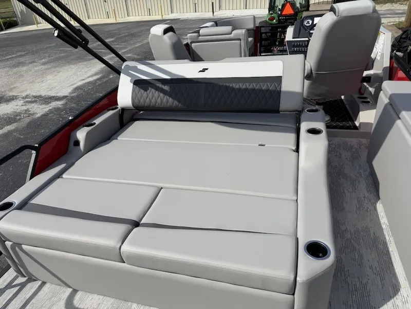 Slide: The Image of 2026 Starcraft SLS 3 Q DH boat with luxurious seating area. - 10