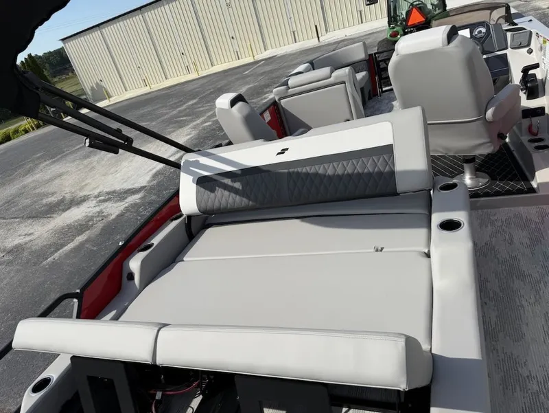 Slide: The Image of Interior of 2026 Starcraft SLS 3 Q DH boat with gray seating. - 12