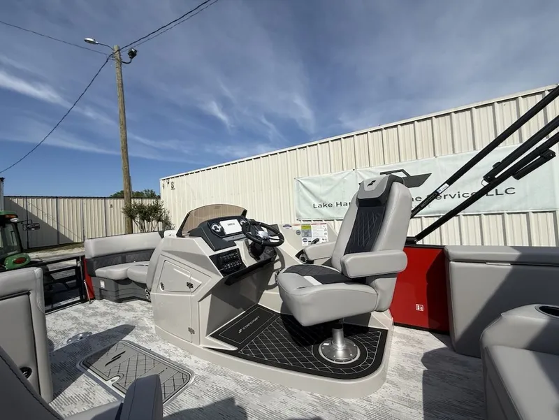 Slide: The Image of 2026 Starcraft SLS 3 Q DH boat helm with modern seating. - 16