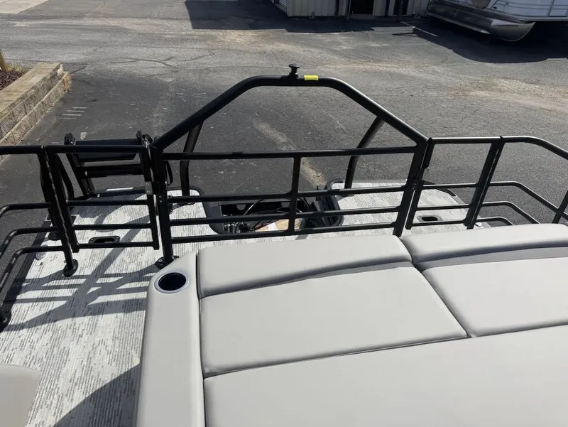 Slide: The Image of Starcraft SLS 3 Q DH 2026 pontoon boat rear view with seating area. - 24