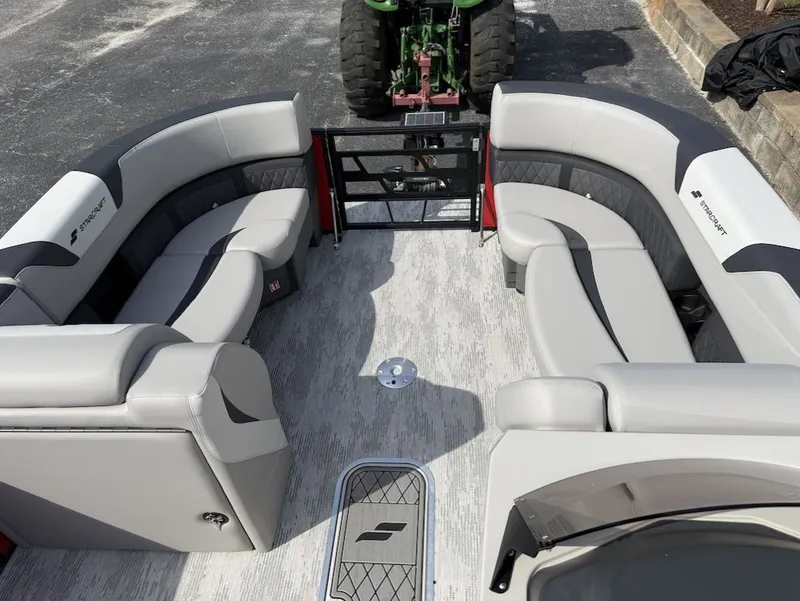 Slide: The Image of Interior of 2026 Starcraft SLS 3 Q DH pontoon boat with gray seating. - 7