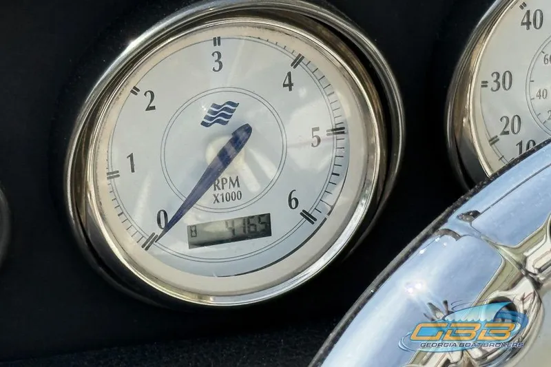 Slide: The Image of Tachometer of 2008 Four Winns F224 boat showing RPM and hours. - 13