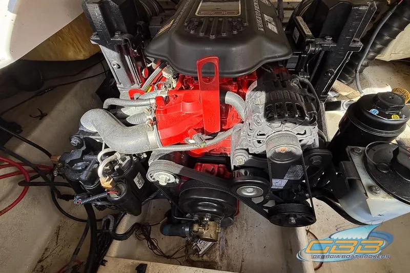 Slide: The Image of Engine of a 2008 Four Winns F224 boat, showcasing mechanical components. - 20