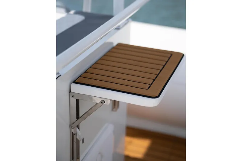Slide: The Image of Manufacturer Provided Image: Foldable wooden table on 2025 Tide Craft Galveston 19 boat. - 12