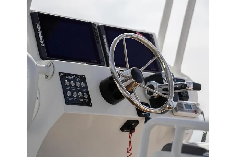 Slide: The Image of Manufacturer Provided Image: Steering console of 2025 Tide Craft Galveston 19 boat with navigation equipment. - 7