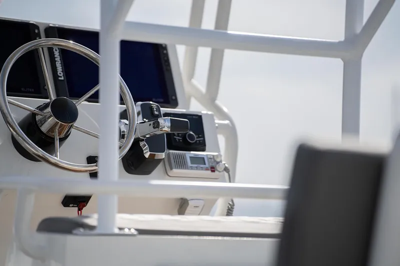 Slide: The Image of Manufacturer Provided Image: Steering console of 2025 Tide Craft Galveston 19 boat with modern controls and displays. - 8