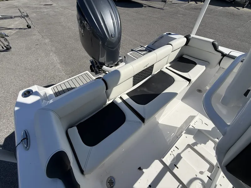 Slide: The Image of Interior of 2026 Tidewater 210 LXF with seating and motor. - 9