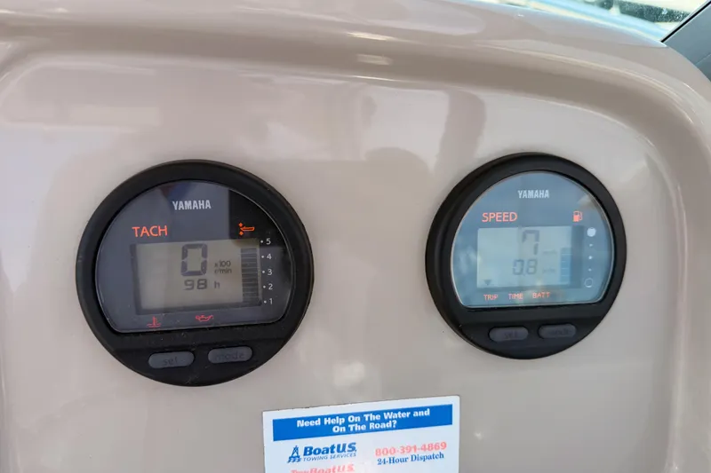 Slide: The Image of Yamaha tachometer and speedometer on 2008 Robalo R225 Walkaround boat dashboard. - 16
