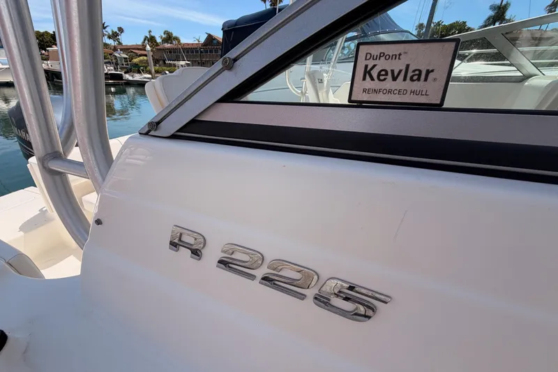 Slide: The Image of 2008 Robalo R225 Walkaround boat with DuPont Kevlar reinforced hull. - 4