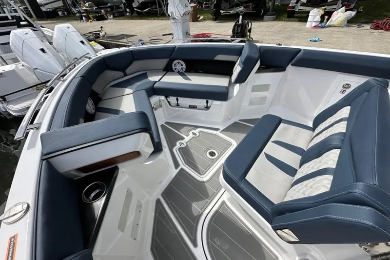 Slide: The Image of Luxurious seating on 2025 Monterey Elite 30 OB boat, featuring sleek design and modern upholstery. - 15