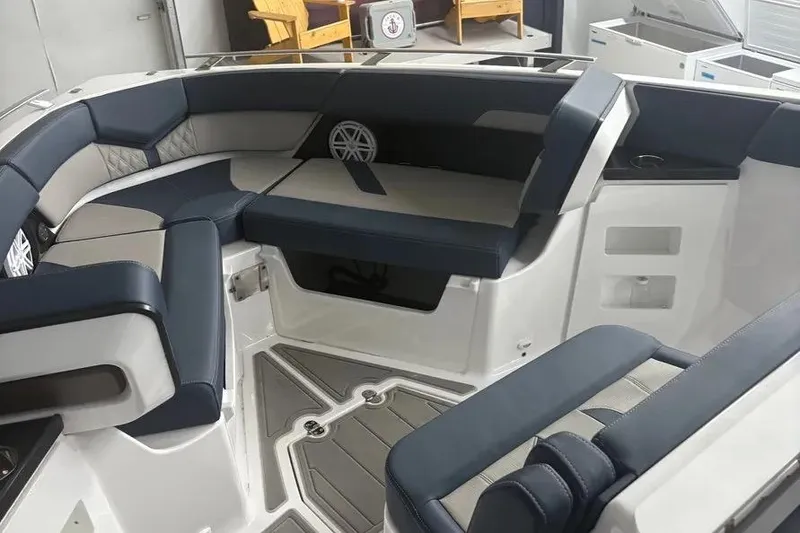 Slide: The Image of Luxurious seating area on a 2025 Monterey Elite 30 OB boat. - 4