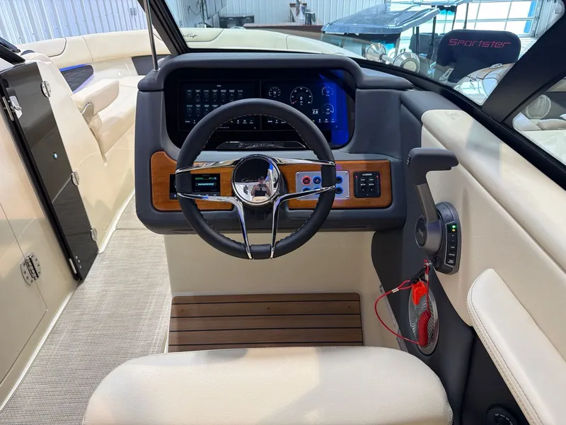 Slide: The Image of Interior view of 2026 Chris-Craft Sportster 28 with modern dashboard. - 23