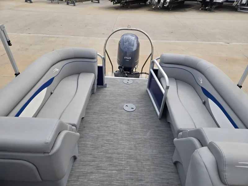 Slide: The Image of Interior of a 2022 Bennington 22SVSRST pontoon boat with gray seating. - 3