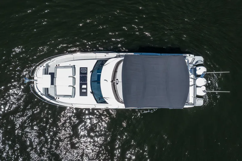 Slide: The Image of Aerial view of 2024 Jeanneau NC 1295 Fly yacht on water. - 10
