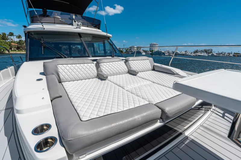 Slide: The Image of 2024 Jeanneau NC 1295 Fly yacht with luxurious sunbathing area on deck. - 30