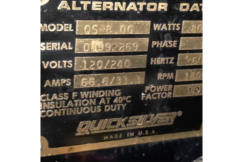 Slide: The Image of Close-up of Quicksilver alternator data plate on 1989 Sea Ray 420 Sundancer. - 68