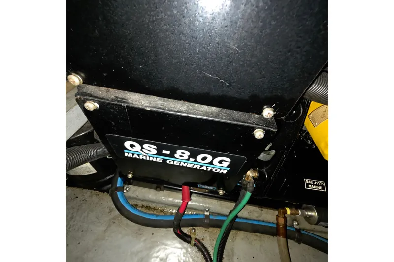 Slide: The Image of Marine generator in 1989 Sea Ray 420 Sundancer engine room. - 73