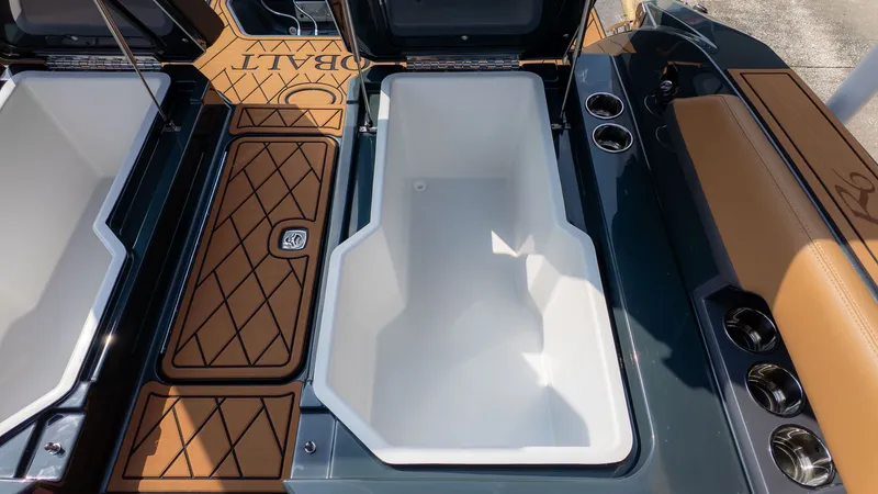 Slide: The Image of Interior of 2026 Cobalt R6 with storage and cup holders. - 15