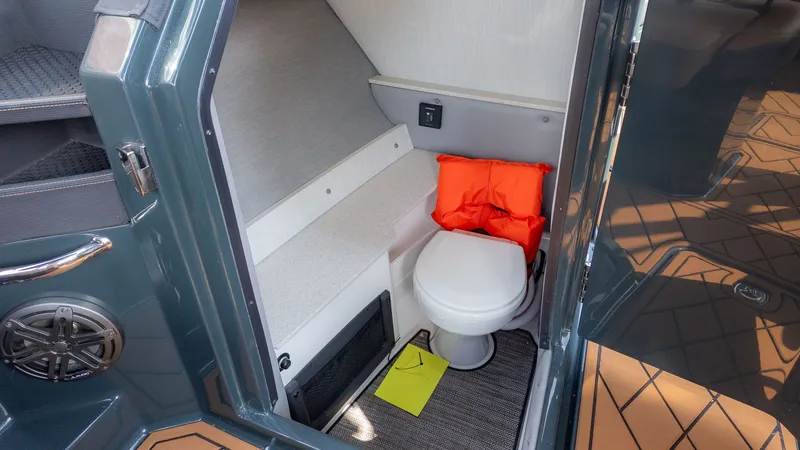 Slide: The Image of Interior of 2026 Cobalt R6 featuring toilet and life jacket. - 19
