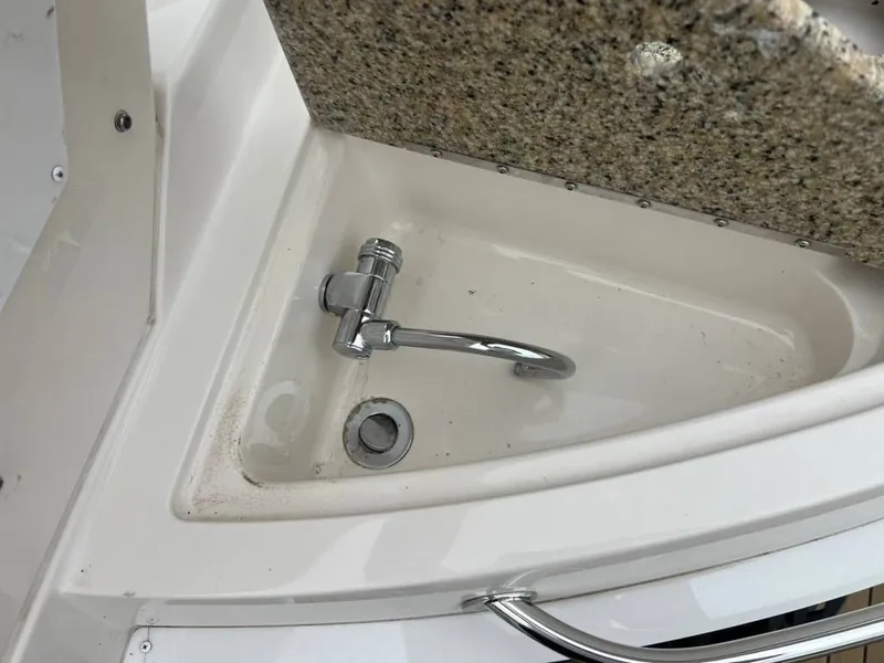 Slide: The Image of Sink on a 2011 Monterey 260 SCR boat. - 14