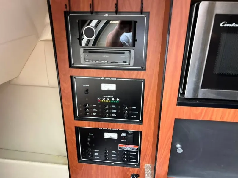 Slide: The Image of Interior of 2011 Monterey 260 SCR with control panel. - 19