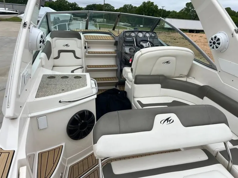 Slide: The Image of Interior of a 2011 Monterey 260 SCR boat with seating area. - 8