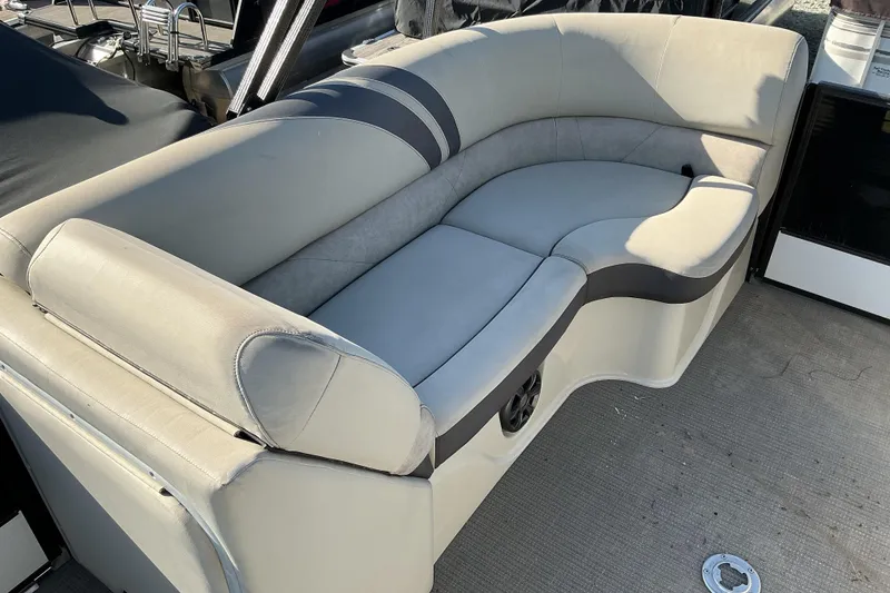 Slide: The Image of Luxurious seating on 2019 Crest Classic 230 SLC pontoon boat. - 13