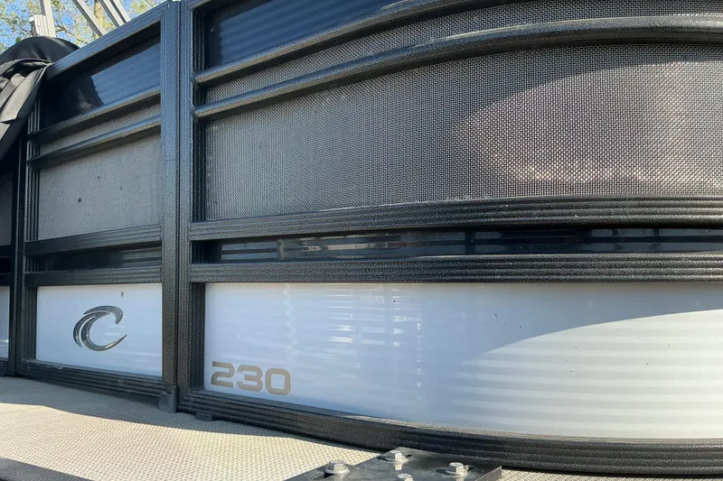 Slide: The Image of 2019 Crest Classic 230 SLC pontoon boat side view with logo and model number. - 7
