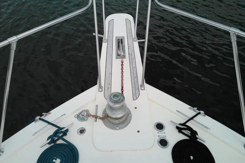 Slide: The Image of Bow of 1986 Viking 44 Motor Yacht with anchor chain and ropes. - 22