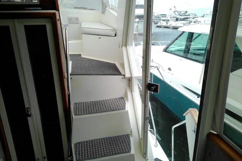 Slide: The Image of Interior view of 1986 Viking 44 Motor Yacht with steps leading to deck. - 8