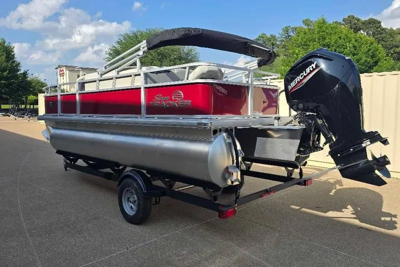Slide: The Image of 2026 Sun Tracker Bass Buggy 18 DLX pontoon boat with Mercury outboard motor. - 10
