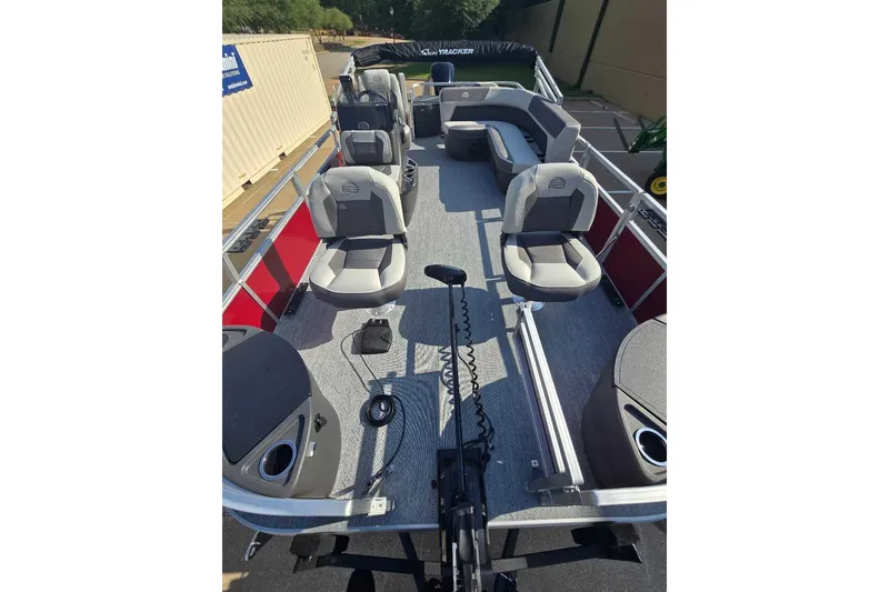 Slide: The Image of 2026 Sun Tracker Bass Buggy 18 DLX pontoon boat with spacious seating and modern design. - 6
