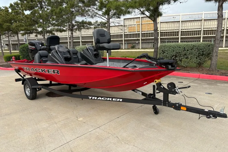 Slide: The Image of 2026 Tracker Pro Team 175 boat in vibrant red on a trailer. - 10