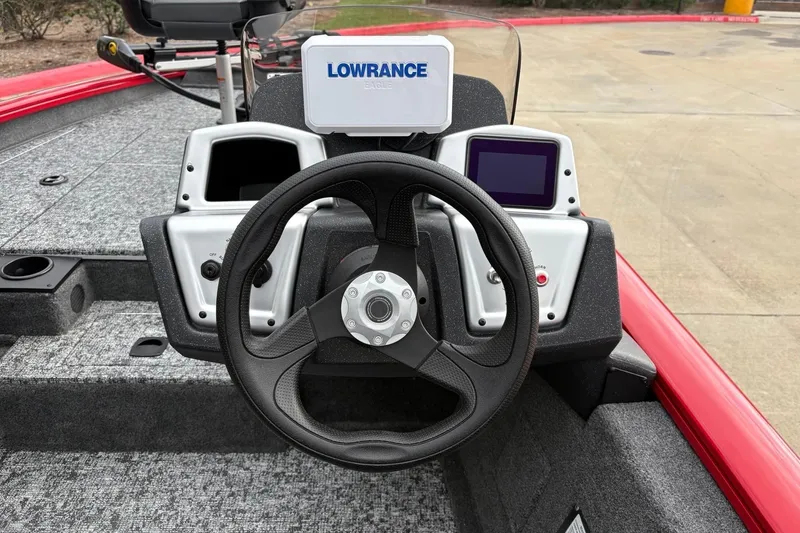 Slide: The Image of Steering console of 2026 Tracker Pro Team 175 boat with Lowrance electronics. - 11