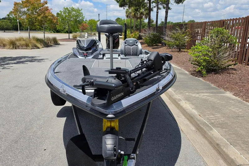 Slide: The Image of 2026 Ranger Z521R Cup-Equipped boat with Garmin equipment, parked outdoors on a sunny day. - 6