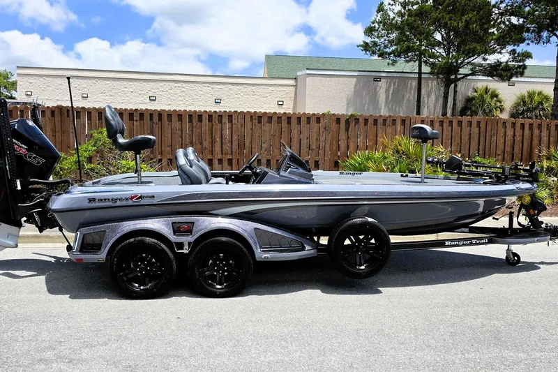 The Image of 2026 Ranger Z521R Cup-Equipped boat, sleek design, parked outdoors on a sunny day. - 0