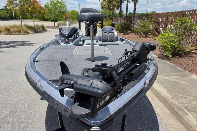 Slide: The Image of 2026 Ranger Z521R Cup-Equipped boat with Garmin equipment, parked outdoors. - 7