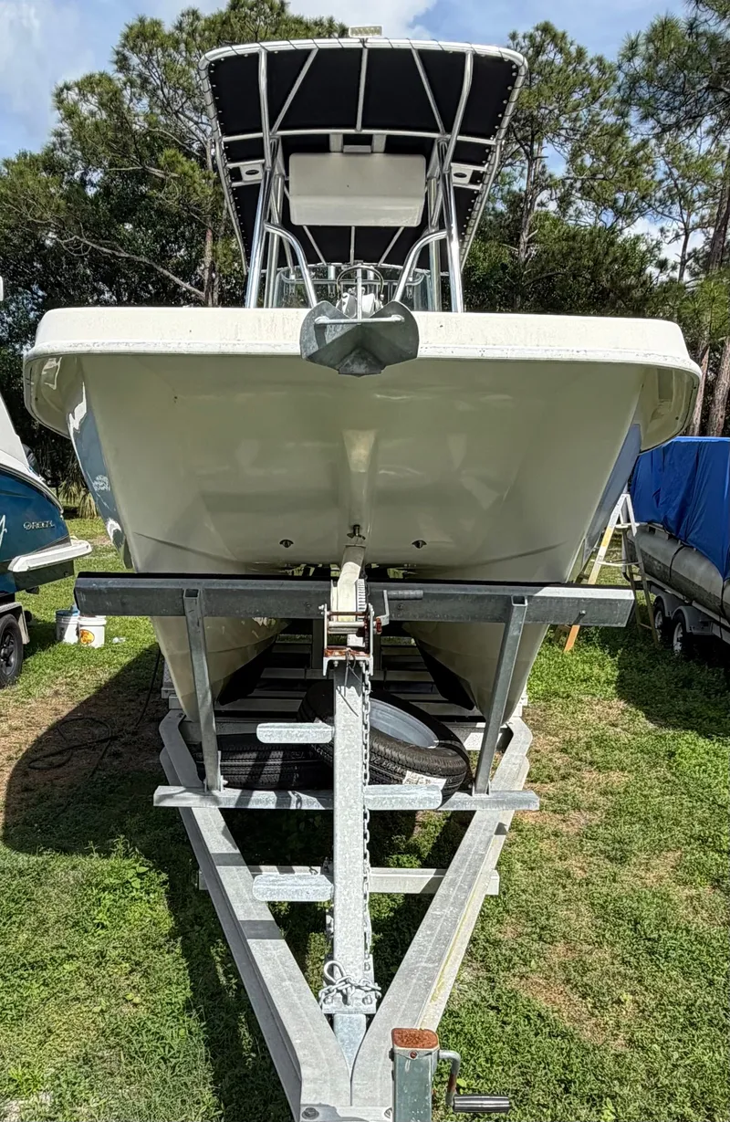 Slide: The Image of 2018 Twin Vee 260GF boat on trailer, front view. - 19