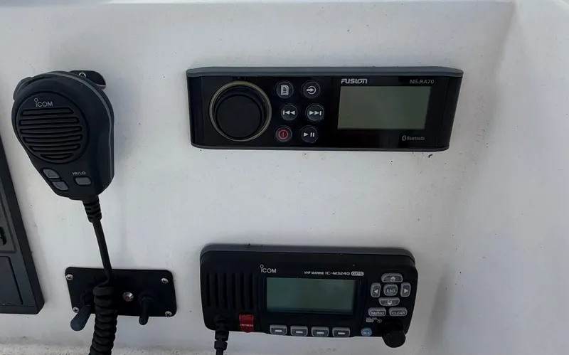 Slide: The Image of Boat controls with Fusion MS-RA70 and Icom VHF devices, Twin Vee 260GF 2018. - 21
