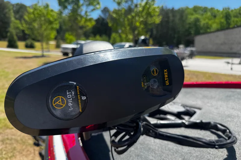 Slide: The Image of 2019 Skeeter ZX200 boat with i-Pilot Link Ultrex trolling motor in a sunny outdoor setting. - 4