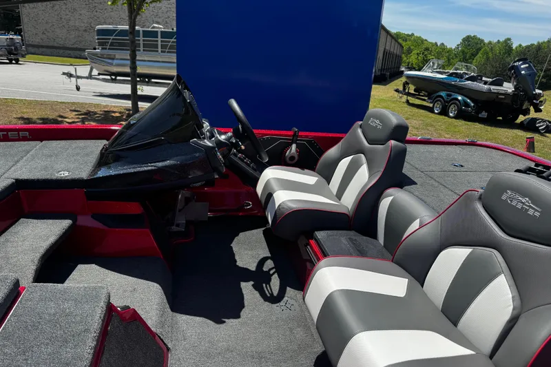 Slide: The Image of 2019 Skeeter ZX200 boat interior with dual seats and steering console. - 7
