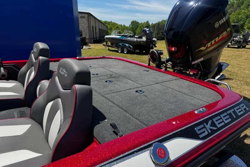 Slide: The Image of 2019 Skeeter ZX200 boat with Yamaha engine, featuring sleek seating and spacious deck. - 8